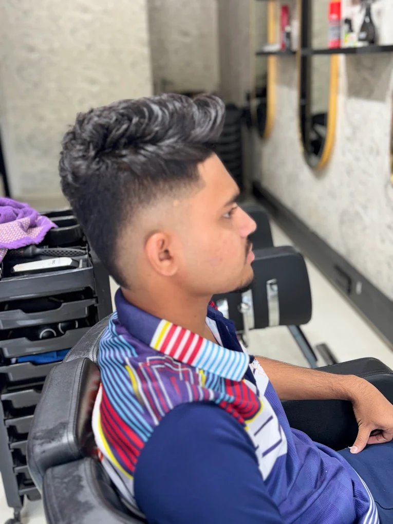 Sharp taper fade with volume on top